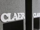 expand Claer laser cut acrylic logo close up